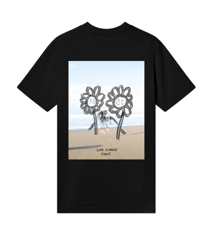 DOS FLORES EN LA PLAYA