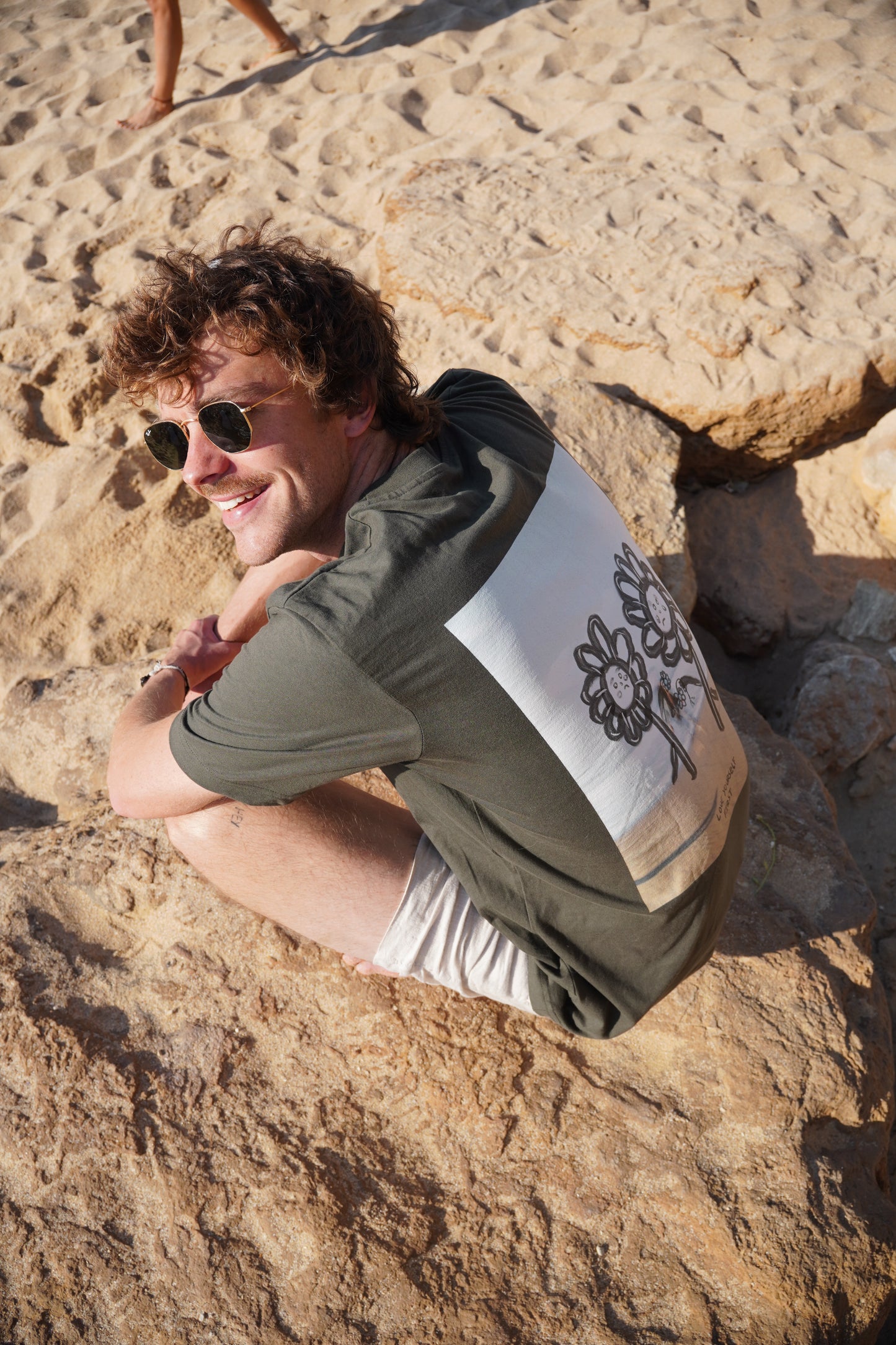 DOS FLORES EN LA PLAYA